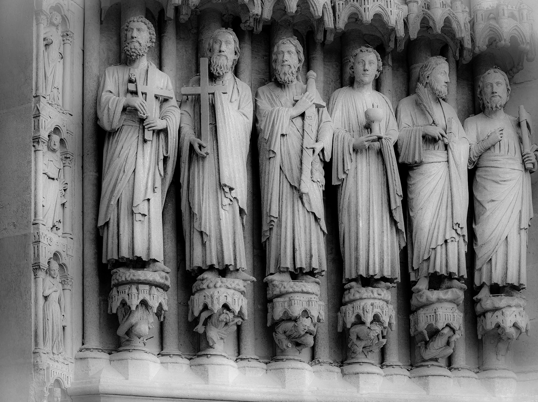 black-and-white, dreamlike image of portal statues at Amiens Cathedral