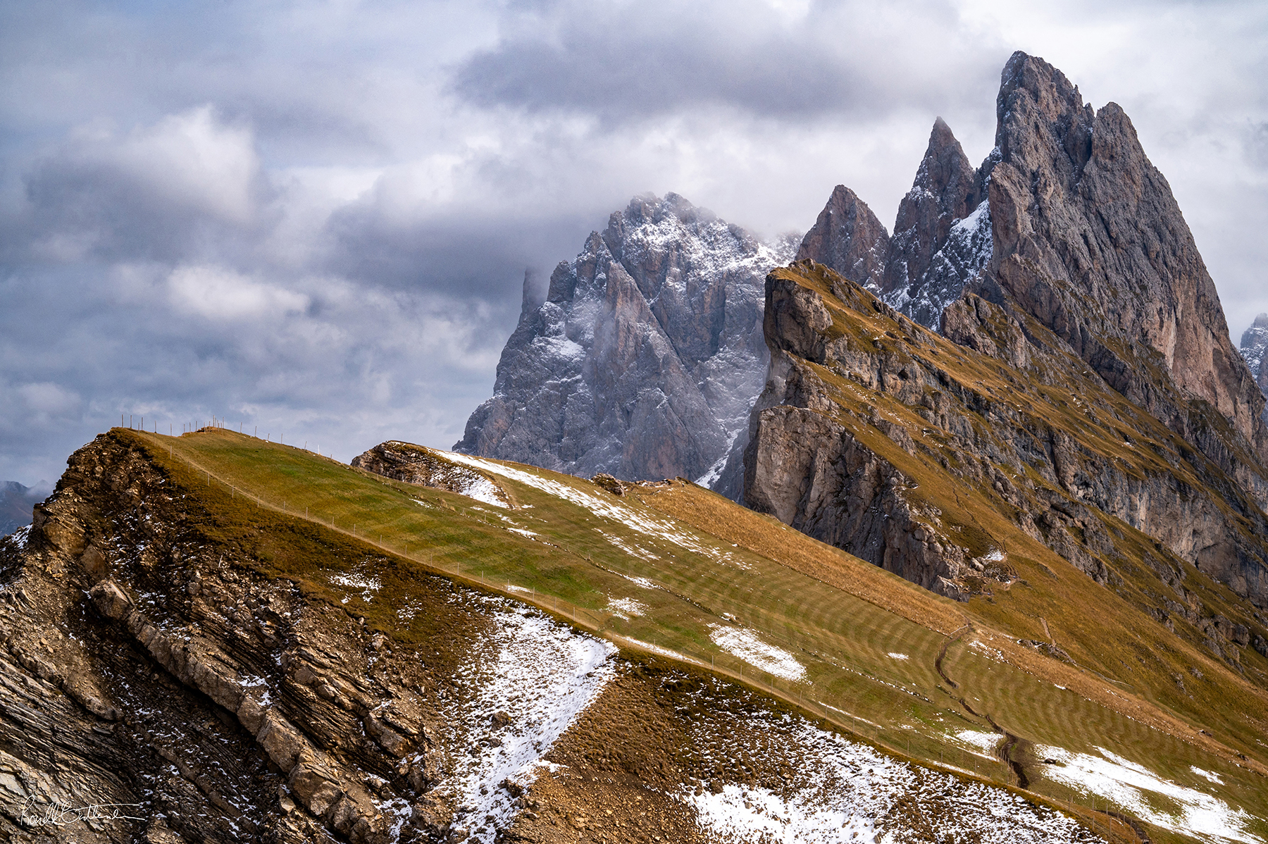 green peaks at Seceda with patches of snow