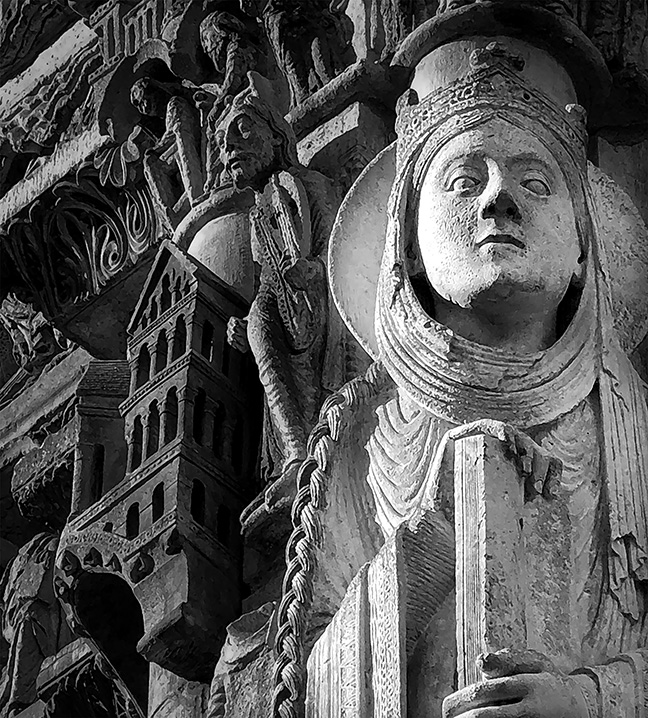 Black and white rendering of sculptural figures on the facade of a gothic church.