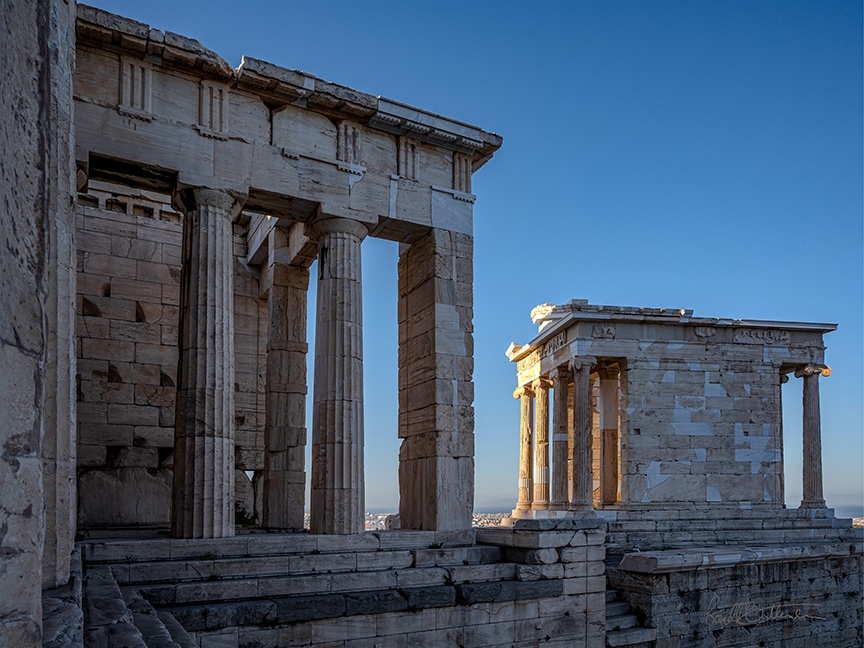 Ancient colonnaded buildings surmounting the entrance to the Acropolis, Athens.
