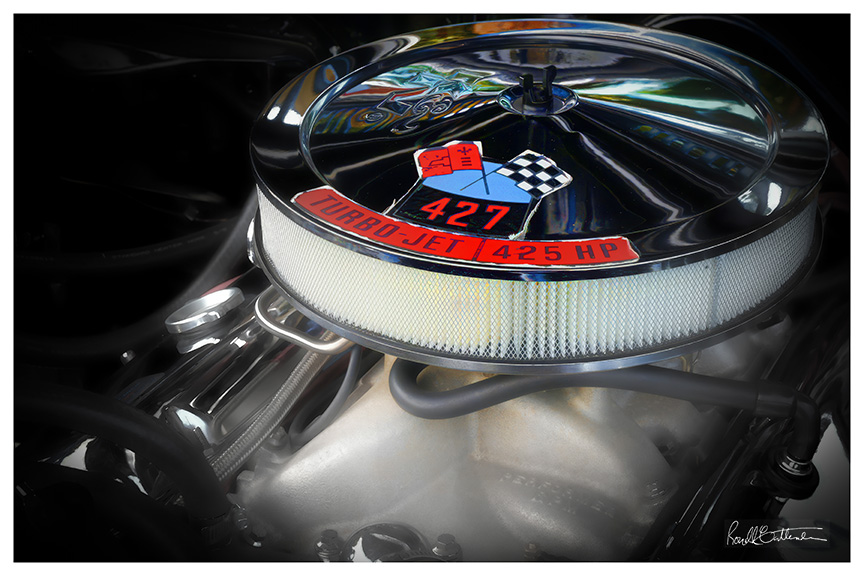Highly polished components of a 1960s 427 Hemi auto engine.